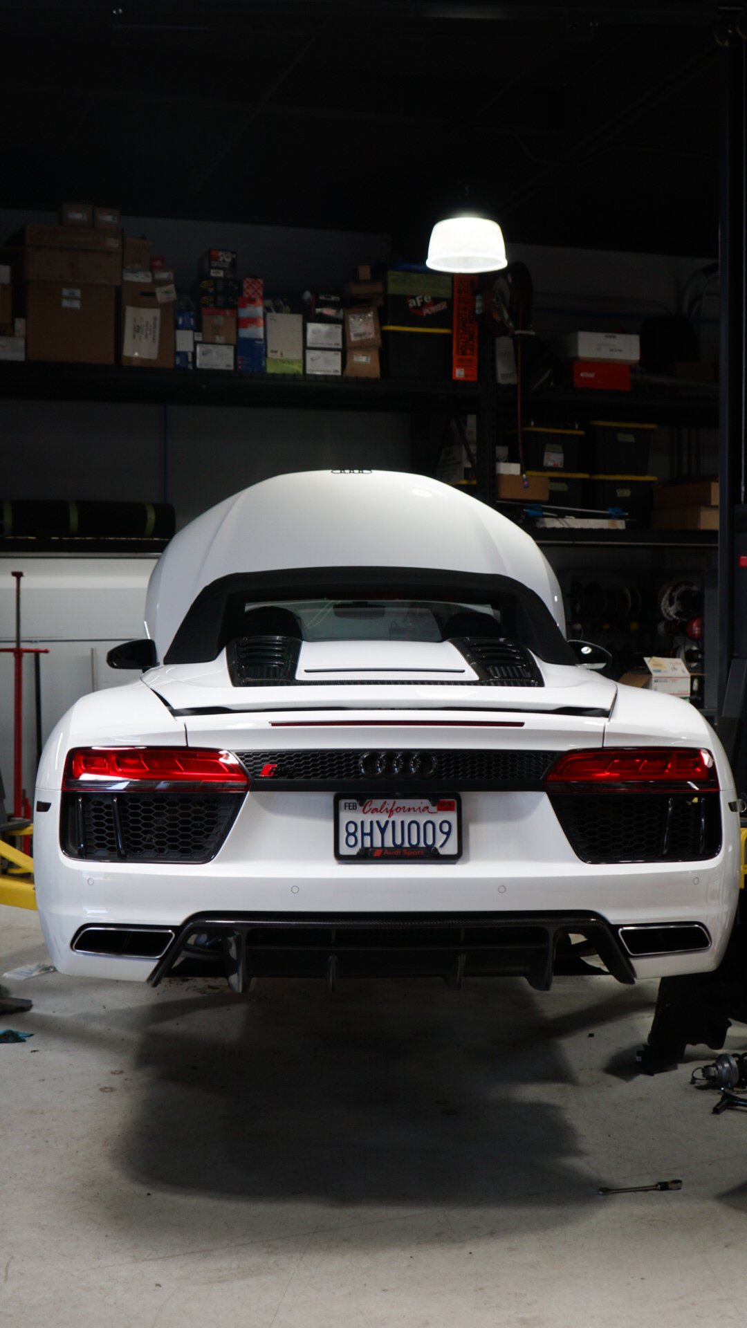 White Audi being prepped for ceramic coating