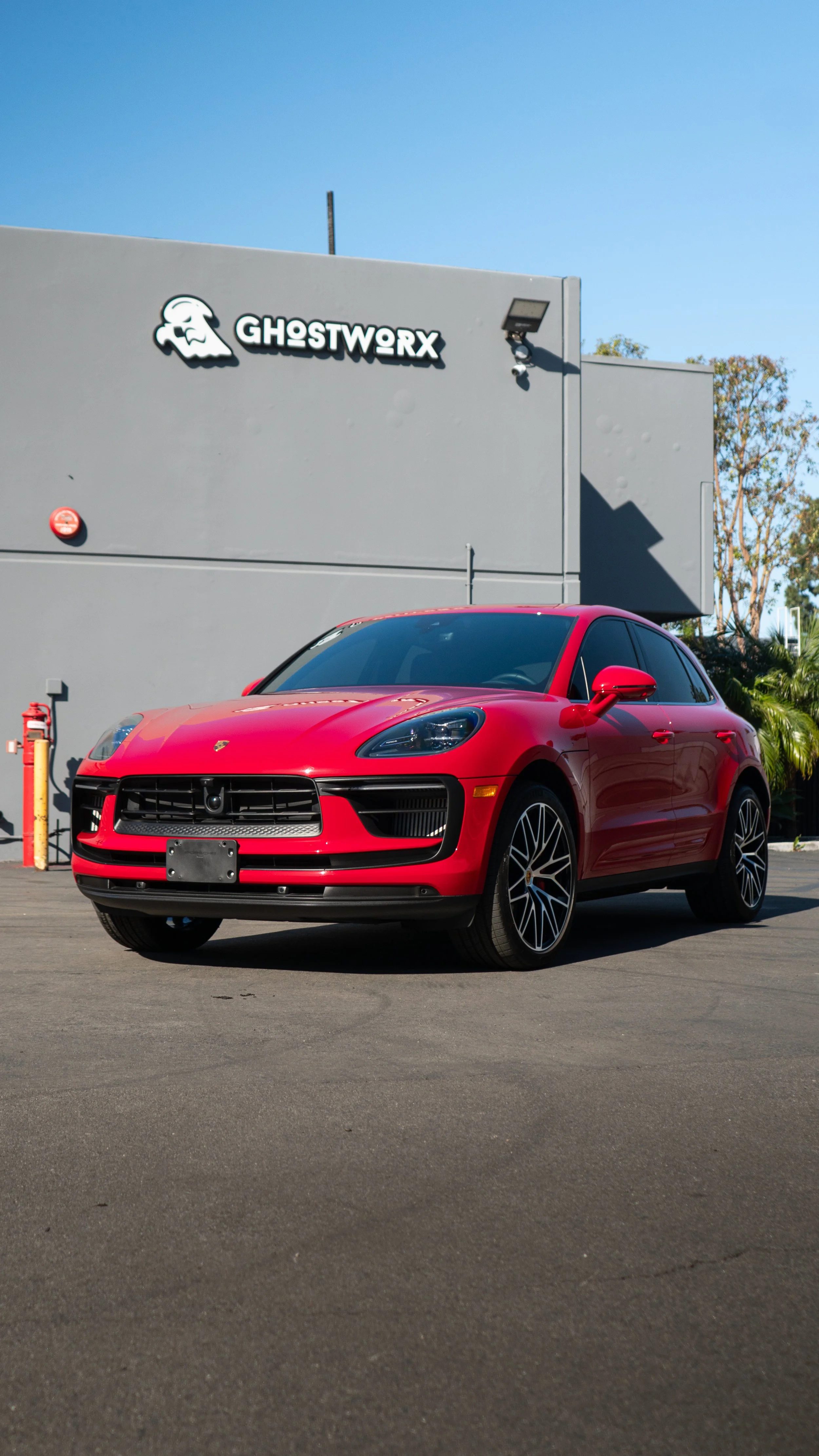 Red Porsche SUV coated at NDG Detailing in Orange, CA