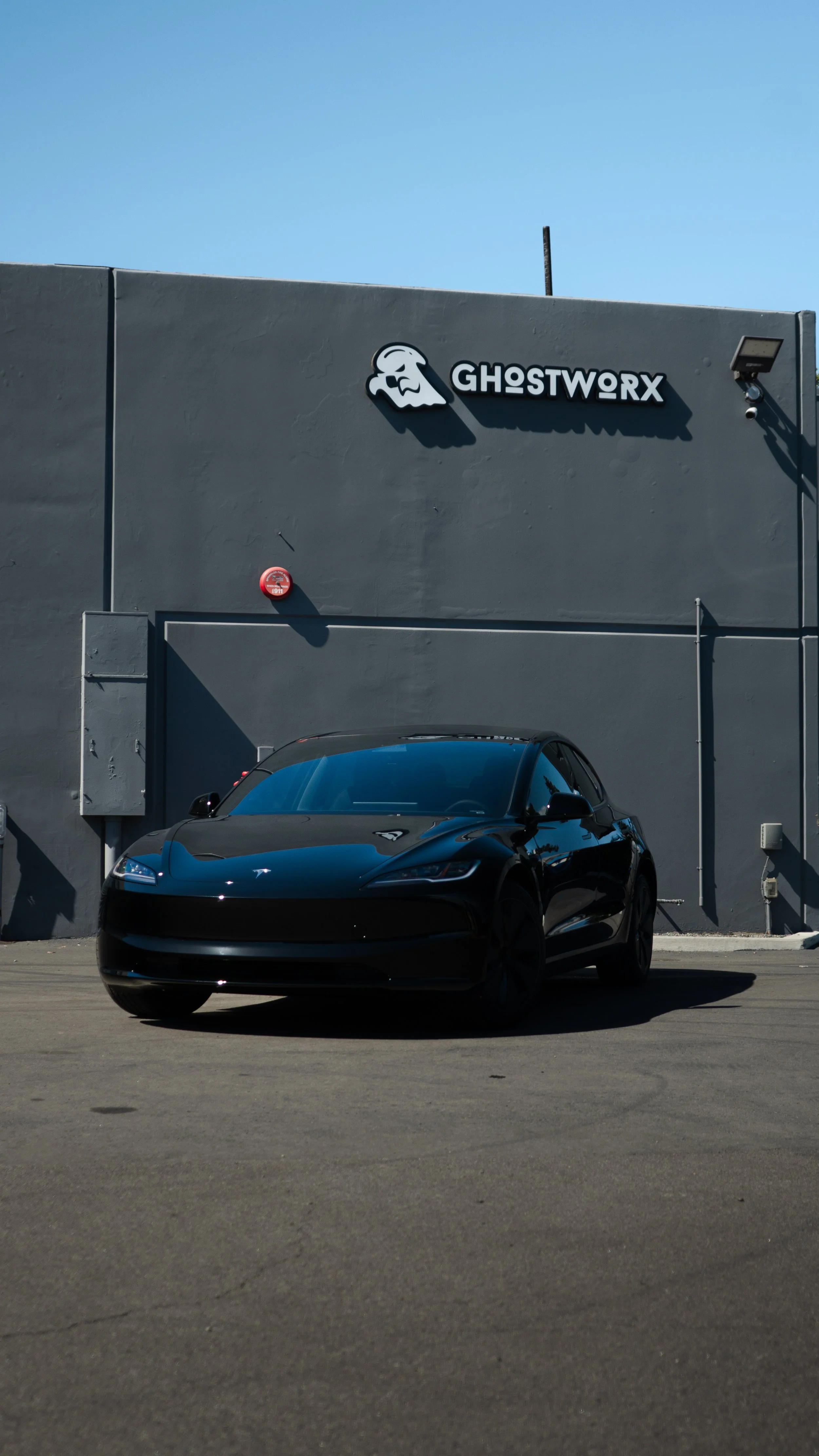 Black Tesla after ceramic coating in Orange County